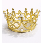 Gold decorative crown with pearl accents on a white background