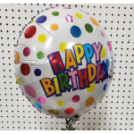 Round birthday balloon with colorful polka dots and "HAPPY BIRTHDAY" text