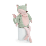 Plush fox toy sitting on a white cylinder