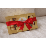 Ferrero Rocher chocolate gift box tied with a red ribbon