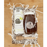 Gift box with herbal tea, honey, and a honey dipper
