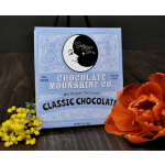 Chocolate box with yellow flowers and an orange bloom