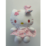Hello Kitty plush doll in a pink floral dress