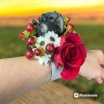 Red rose wrist corsage with white daisies and red berries