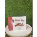 Box of Fannie May milk chocolate Pixies on a round table