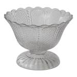 Clear glass pedestal bowl with a scalloped rim and textured pattern