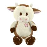 Plush cow toy with a pink heart on its chest