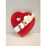 Heart-shaped box of Russell Stover chocolates with red pleated lid