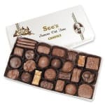 Box of assorted chocolates with a white lid