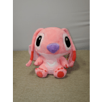 Pink plush bunny toy with large eyes and floppy ears