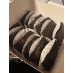 Box of chocolate brownies in white paper liners