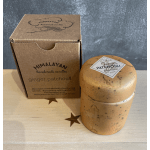 Boxed ginger patchouli candle beside a matching jar candle