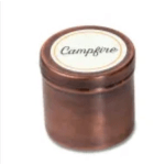 Brown candle jar with a white lid labeled Campfire