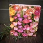Box of tulip puzzle with pink, orange, and yellow flowers