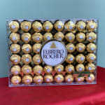 Box of Ferrero Rocher chocolates in gold wrappers