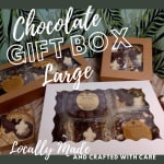 Chocolate gift boxes with assorted treats in clear windows
