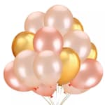 Cluster of metallic peach, pink, and gold balloons on strings