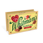 Box of Whitman's assorted chocolates with a heart tag
