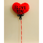 Red heart-shaped balloon with "I LOVE YOU" text and a ribbon on a stick