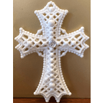 White beaded cross ornament with a clear gem center