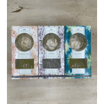 Three Greenleaf floral-scented diffuser boxes with flower-shaped tops