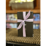 Gift box tied with a pale pink ribbon