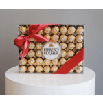 Box of Ferrero Rocher chocolates tied with a red ribbon