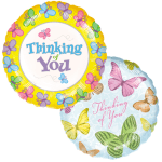 Two butterfly-themed "Thinking of You" balloons