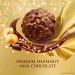 Hazelnut milk chocolate candy with hazelnuts on a gold background
