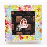 Box of assorted chocolates with a colorful floral border