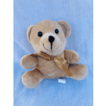 Small beige teddy bear with a gold ribbon bow