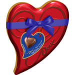 Heart-shaped box of Dove chocolate tied with a blue ribbon