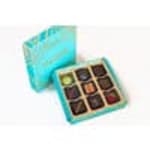 Box of assorted chocolates in a turquoise gift box