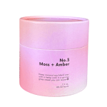 Pink and lavender scented candle in a cylindrical container