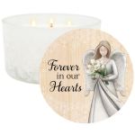 White memorial candle with an angel label and three flames