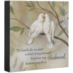 Decorative memorial plaque with two white doves and a sympathy quote