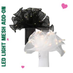 Black and white mesh LED light mesh add-on on a vase