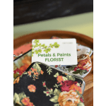 Floral-patterned coin purses with a florist gift card