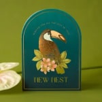 Decorative card with a bird illustration and floral accents