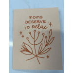 Greeting card reading "moms deserve to relax" with a simple floral line drawing