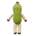 Knitted plush toy shaped like a green cactus with a small hat