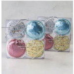Two clear gift boxes of assorted frosted cookies in pastel colors tied with silver string
