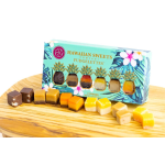 Tropical-themed box of Hawaiian assorted fudge candies with colorful fudge cubes on a wooden board