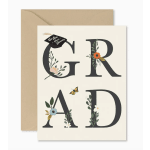 Graduation card with large letters and floral accents beside an envelope