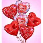 Heart-shaped red and floral-print balloons with love messages