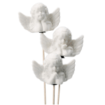 Three white angel figurines on sticks