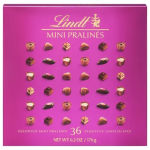 Pink Lindt Mini Pralinés chocolate box with rows of assorted miniature pralines on the front