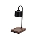 Black metal tabletop lamp with a square base