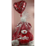 Red teddy bear gift with heart balloon and clear wrapping