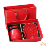 Red gift box with a mug and matching lid set